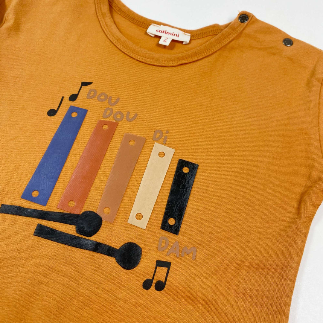 Catimini orange music print long-sleeve 2Y/86 2
