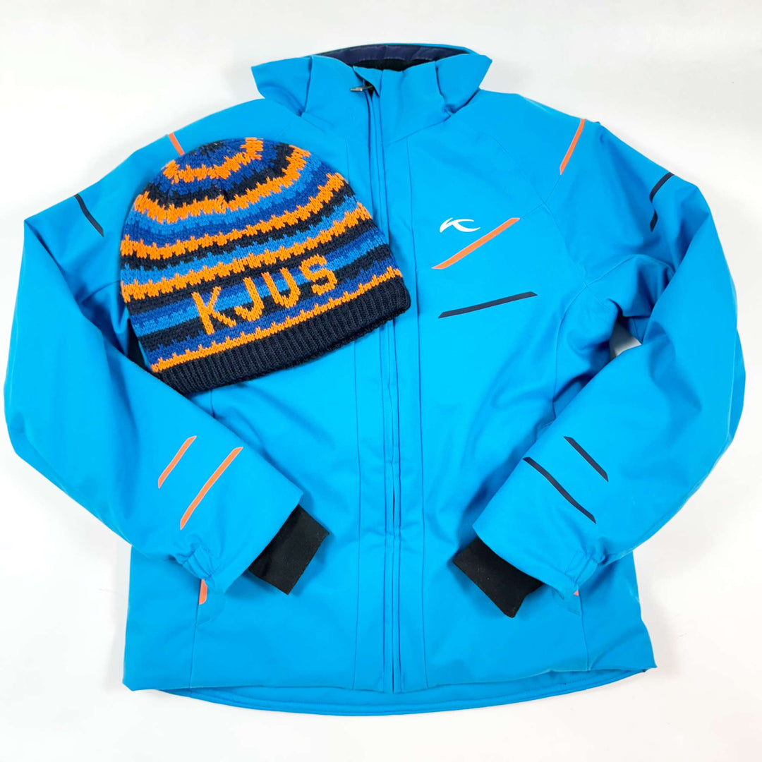 Kjus blue ski jacket with detachable hood and matching hat 128