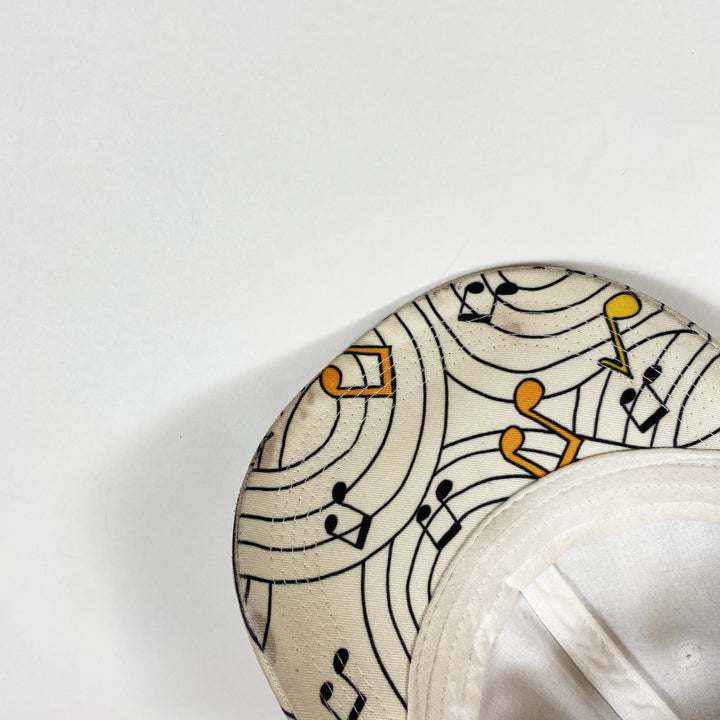 Mini Rodini ivory music note cap 48-50