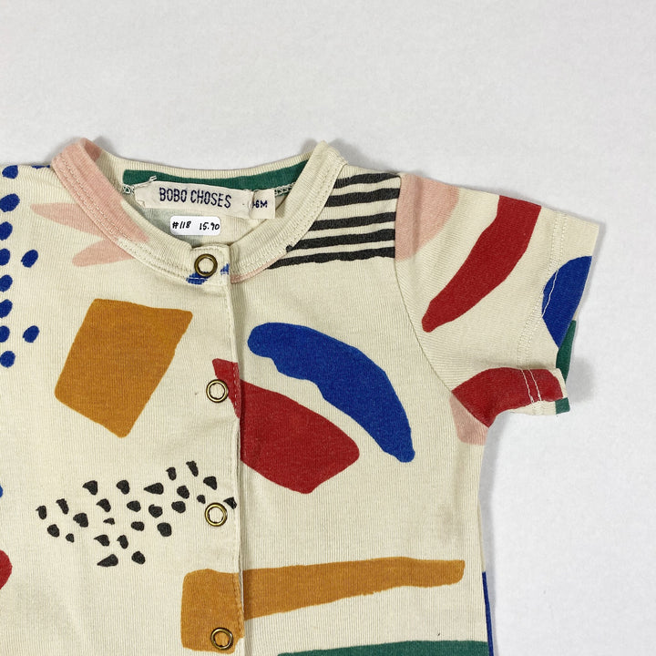 Bobo Choses ecru short-sleeved jumpsuit with colourful shapes print