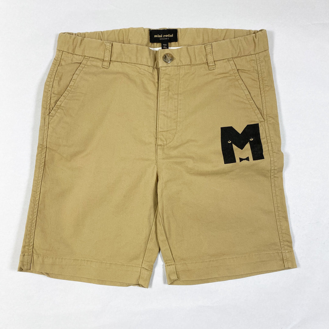 Mini Rodini beigefarbene Shorts mit M-Print 140-146