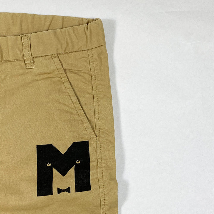 Mini Rodini beigefarbene Shorts mit M-Print 140-146