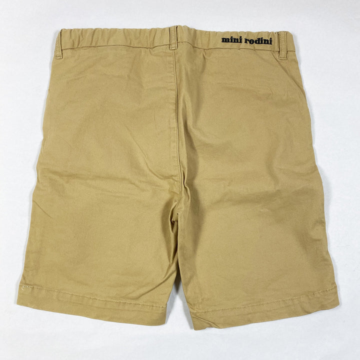 Mini Rodini beigefarbene Shorts mit M-Print 140-146