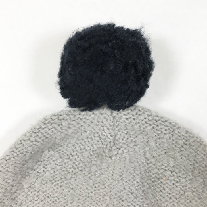 1+ In The Family grey knitted hat with black pompom size 2