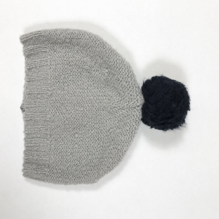 1+ In The Family grey knitted hat with black pompom size 2